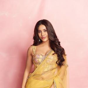 Nabha Natesh Stuns in Vibrant Yellow Saree with Designer Blouse