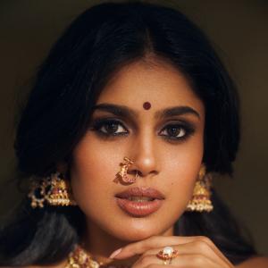 Faria Abdullah Shines in Elegant Maroon Saree with Traditional Jewelry