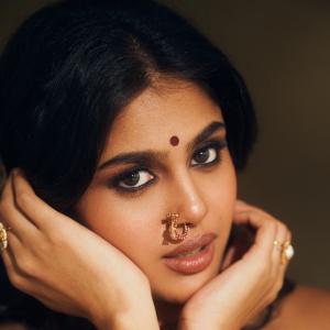 Faria Abdullah Shines in Elegant Maroon Saree with Traditional Jewelry