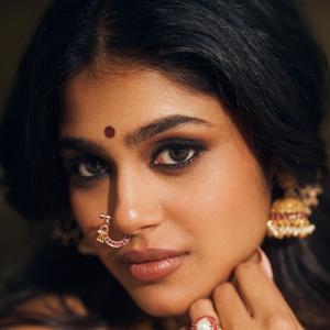 Faria Abdullah Shines in Elegant Maroon Saree with Traditional Jewelry