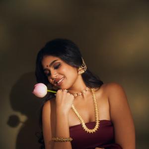 Faria Abdullah Shines in Elegant Maroon Saree with Traditional Jewelry