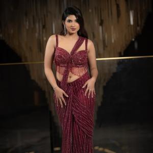 Pragya Nagra Shines in Glamorous Maroon Saree Gown