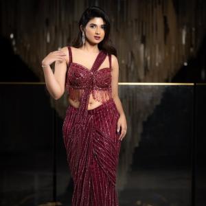 Pragya Nagra Shines in Glamorous Maroon Saree Gown