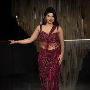 Pragya Nagra Shines in Glamorous Maroon Saree Gown