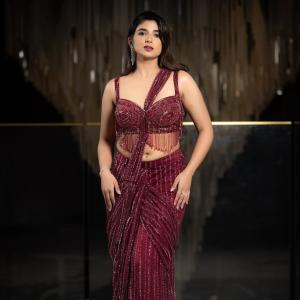 Pragya Nagra Shines in Glamorous Maroon Saree Gown