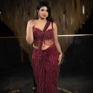 Pragya Nagra Shines in Glamorous Maroon Saree Gown
