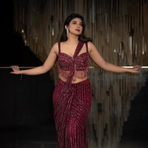 Pragya Nagra Shines in Glamorous Maroon Saree Gown