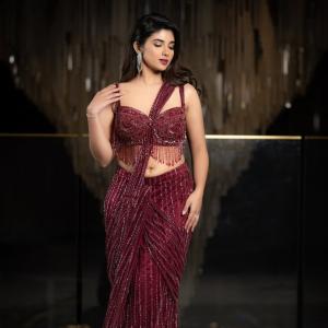 Pragya Nagra Shines in Glamorous Maroon Saree Gown