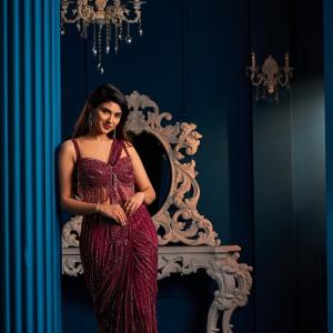 Pragya Nagra Shines in Glamorous Maroon Saree Gown