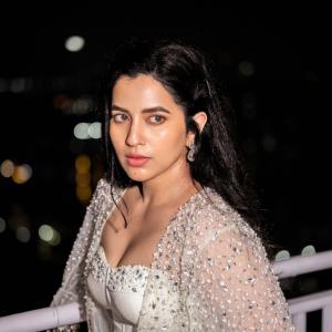 Komalee Prasad Radiates Elegance in White Embellished Outfit