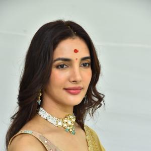 Actress Nakshatra Shines in Golden Saree at Movie Event