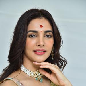 Actress Nakshatra Shines in Golden Saree at Movie Event