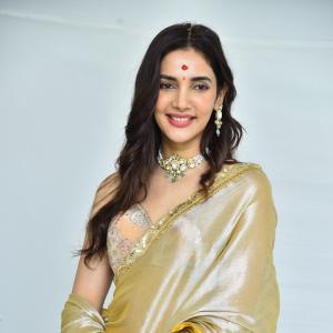 Actress Nakshatra Shines in Golden Saree at Movie Event