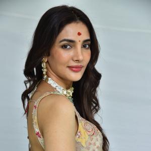 Actress Nakshatra Shines in Golden Saree at Movie Event