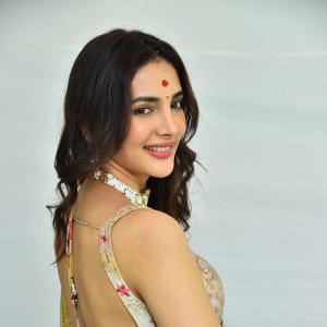 Actress Nakshatra Shines in Golden Saree at Movie Event