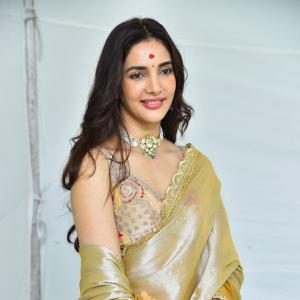 Actress Nakshatra Shines in Golden Saree at Movie Event