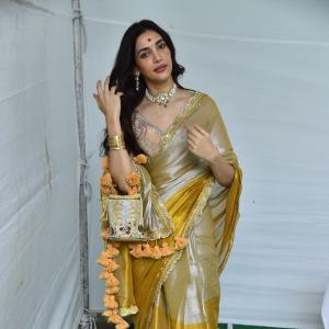 Actress Nakshatra Shines in Golden Saree at Movie Event
