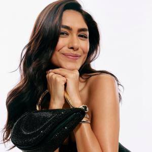 Mrunal Thakur Stuns in Elegant Black Gown at Event