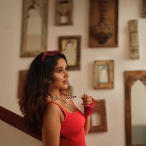 Elegant Red Outfit and Chic Accessories - Actress Anika Surendran