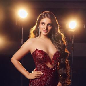 Nidhhi Agerwal Dazzles in Red Dress - A Glimpse of Glamour