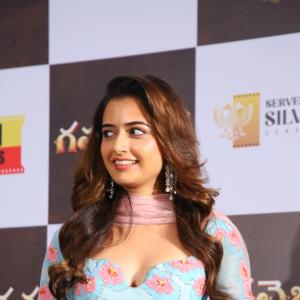 Ashika Rangnath Radiates Elegance in Blue Floral Layered Dress at Movie Event