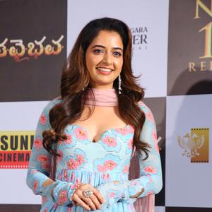 Ashika Rangnath Radiates Elegance in Blue Floral Layered Dress at Movie Event