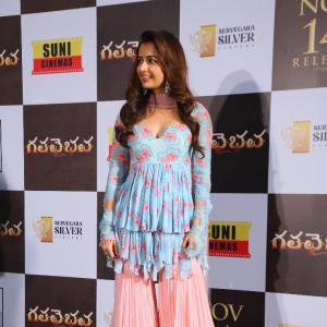 Ashika Rangnath Radiates Elegance in Blue Floral Layered Dress at Movie Event