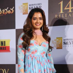 Ashika Rangnath Radiates Elegance in Blue Floral Layered Dress at Movie Event