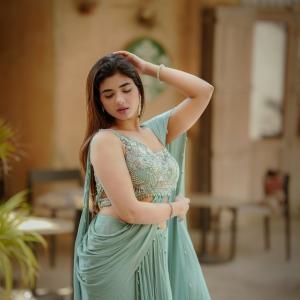 Elegant Pastel Green Saree Look with Modern Draped Style