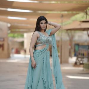 Elegant Pastel Green Saree Look with Modern Draped Style