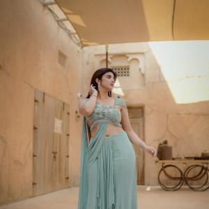 Elegant Pastel Green Saree Look with Modern Draped Style