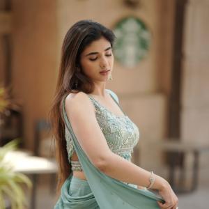 Elegant Pastel Green Saree Look with Modern Draped Style