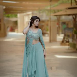 Elegant Pastel Green Saree Look with Modern Draped Style