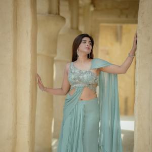 Elegant Pastel Green Saree Look with Modern Draped Style