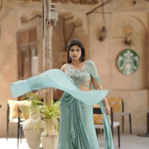 Elegant Pastel Green Saree Look with Modern Draped Style