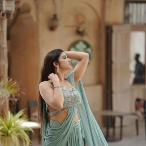 Elegant Pastel Green Saree Look with Modern Draped Style