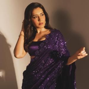 Actress Raashi Khanna Dazzles in a Sparkling Purple Saree