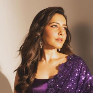 Actress Raashi Khanna Dazzles in a Sparkling Purple Saree