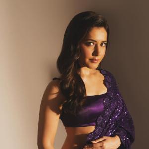 Actress Raashi Khanna Dazzles in a Sparkling Purple Saree