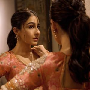 Actress Sara Ali Khan Dazzles in Traditional Peach and Gold Lehenga