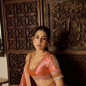 Actress Sara Ali Khan Dazzles in Traditional Peach and Gold Lehenga