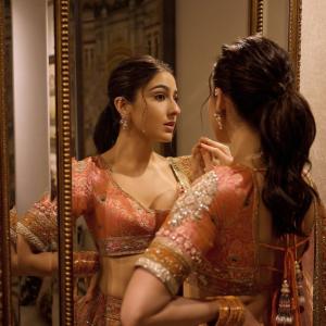 Actress Sara Ali Khan Dazzles in Traditional Peach and Gold Lehenga