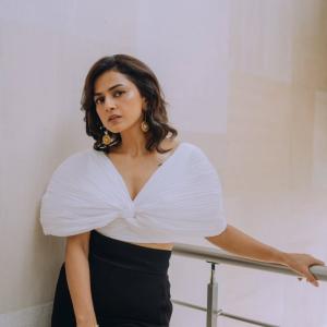 Actress Shraddha Srinath Stuns in Elegant White and Black Ensemble