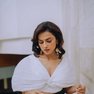 Actress Shraddha Srinath Stuns in Elegant White and Black Ensemble