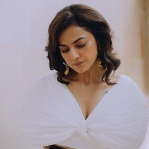 Actress Shraddha Srinath Stuns in Elegant White and Black Ensemble