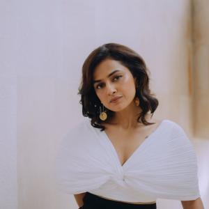 Actress Shraddha Srinath Stuns in Elegant White and Black Ensemble