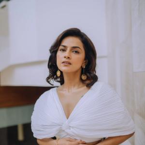 Actress Shraddha Srinath Stuns in Elegant White and Black Ensemble