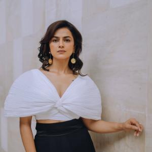 Actress Shraddha Srinath Stuns in Elegant White and Black Ensemble