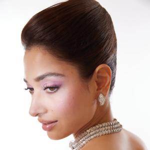 Actress Tamannaah Bhatia Dazzles in Elegant Pink Gown with Statement Bow