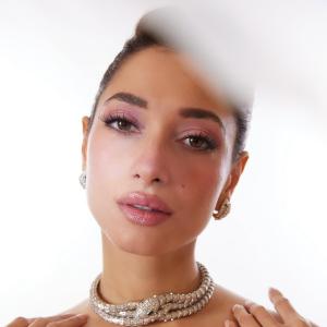 Actress Tamannaah Bhatia Dazzles in Elegant Pink Gown with Statement Bow